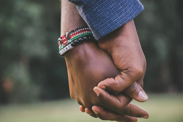 Two people holding hands, representing connection and support through relationship counselling in Darwin.