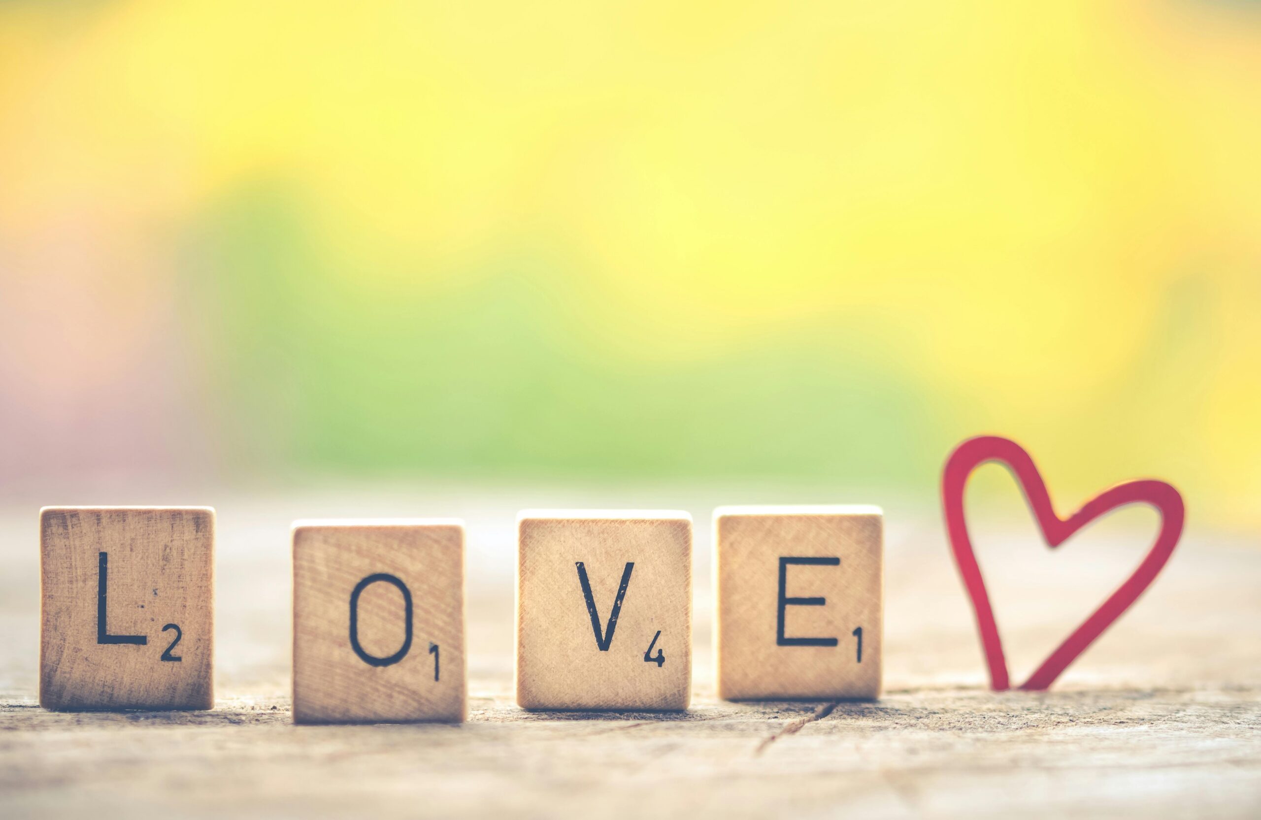 Scrabble letters forming the word love representing the love and connection possible with relationship counselling.