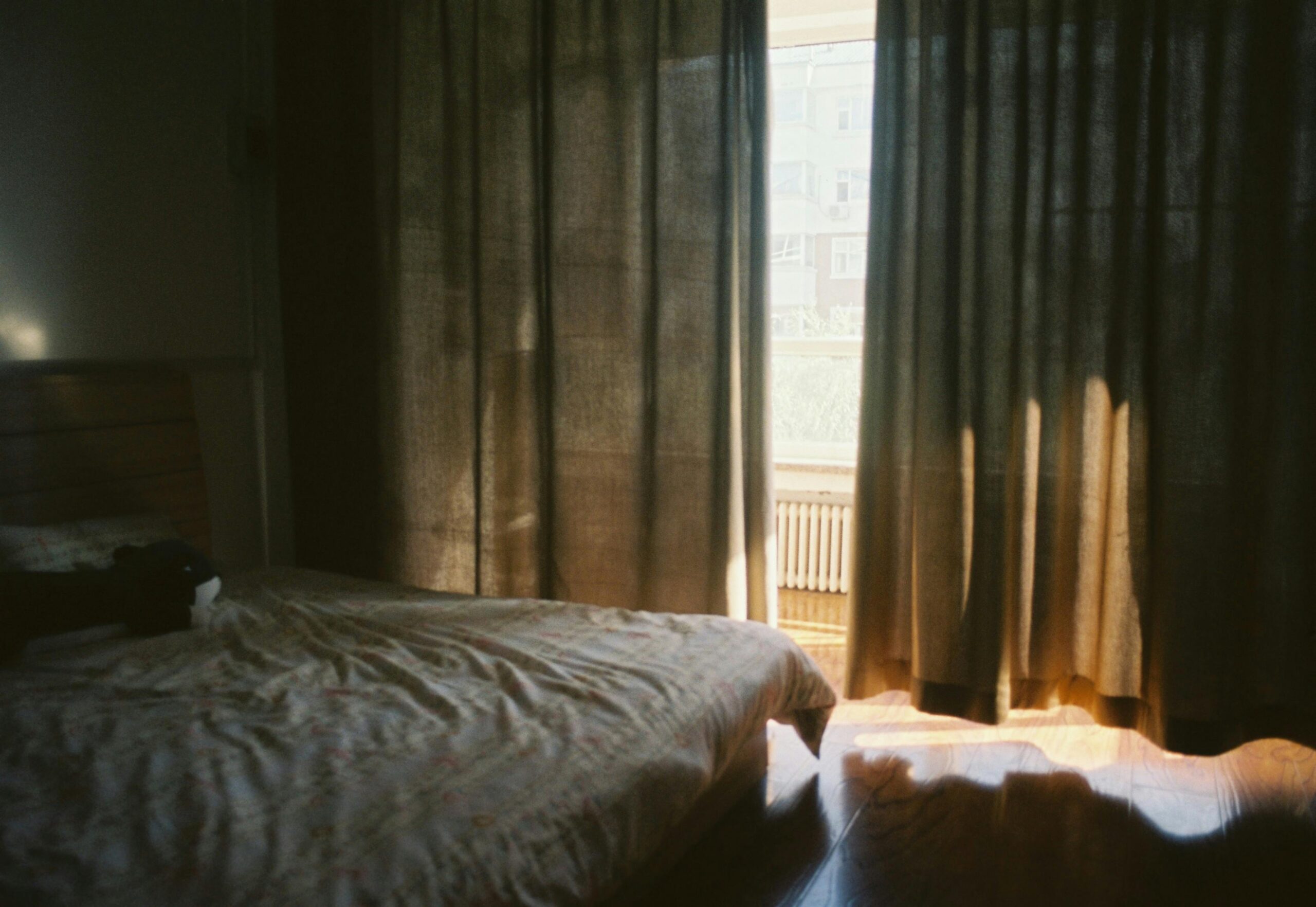Soft morning light through a bedroom window, representing hope and support through depression counselling in Darwin.